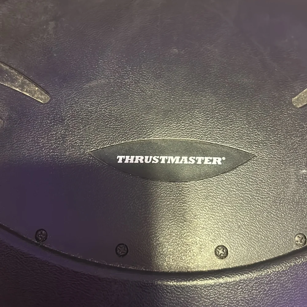 Thrustmaster t80 racing wheel set for PlayStations and can work on pc with code